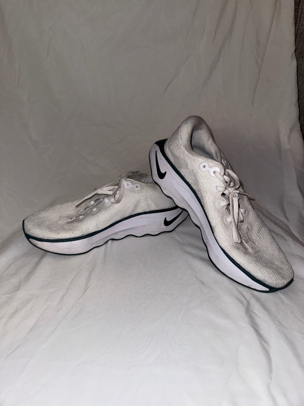 White Nike Motiva